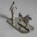 P1140039 75x75 - Zilver Miniatuur man met Keeshond