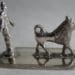P1140067 75x75 - Zilver Miniatuur man met Keeshond